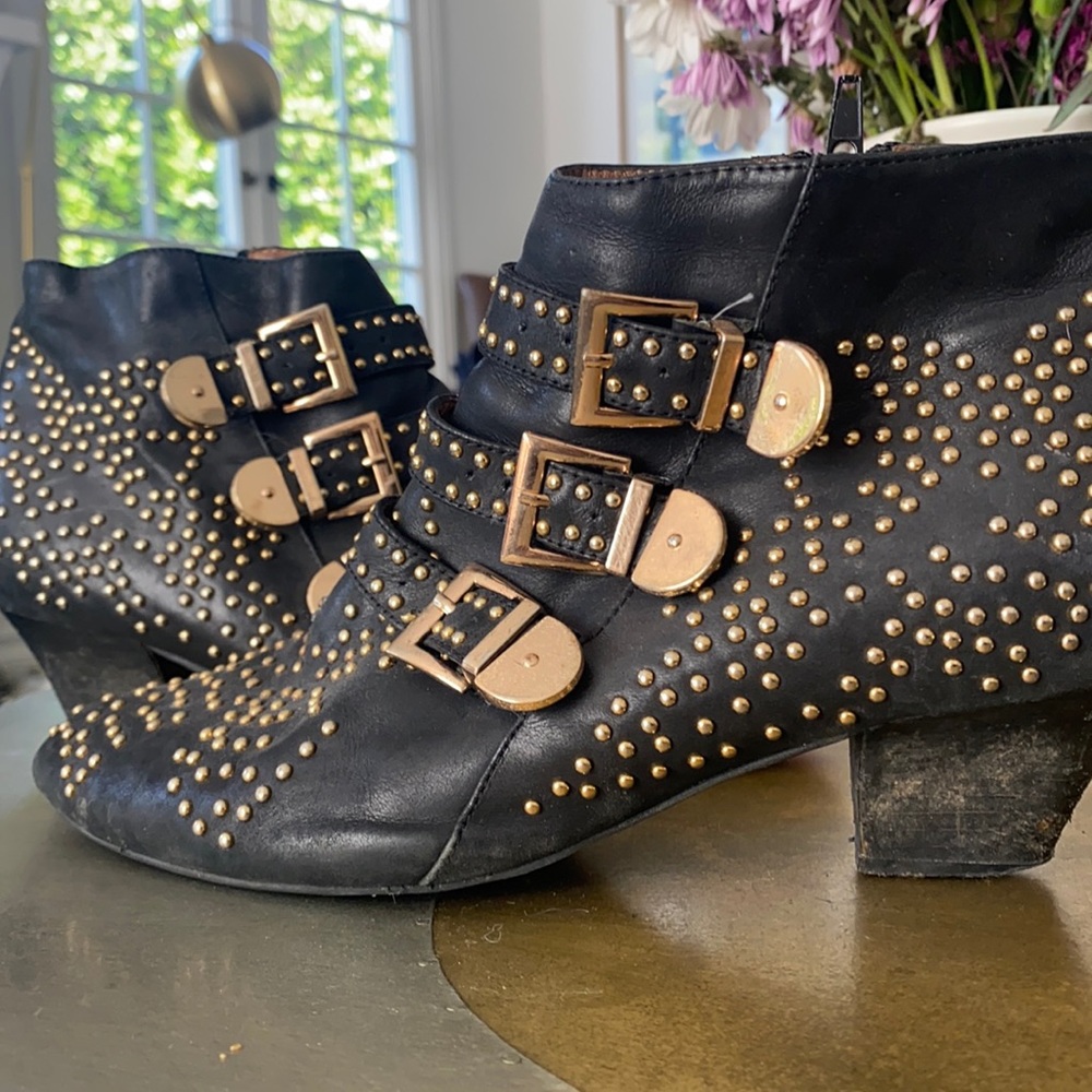 Black booties with gold detail